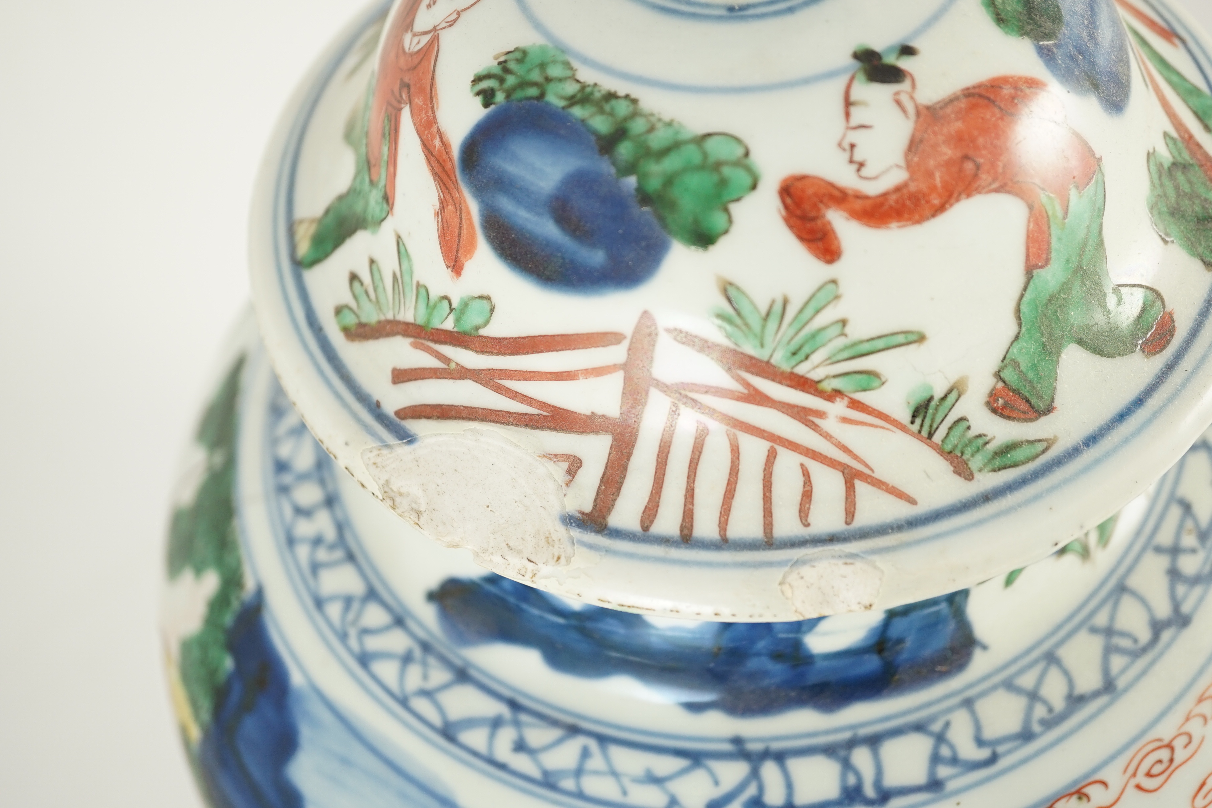 A Chinese Transitional wucai 'boys' vase and cover, c.1640, 41cm high